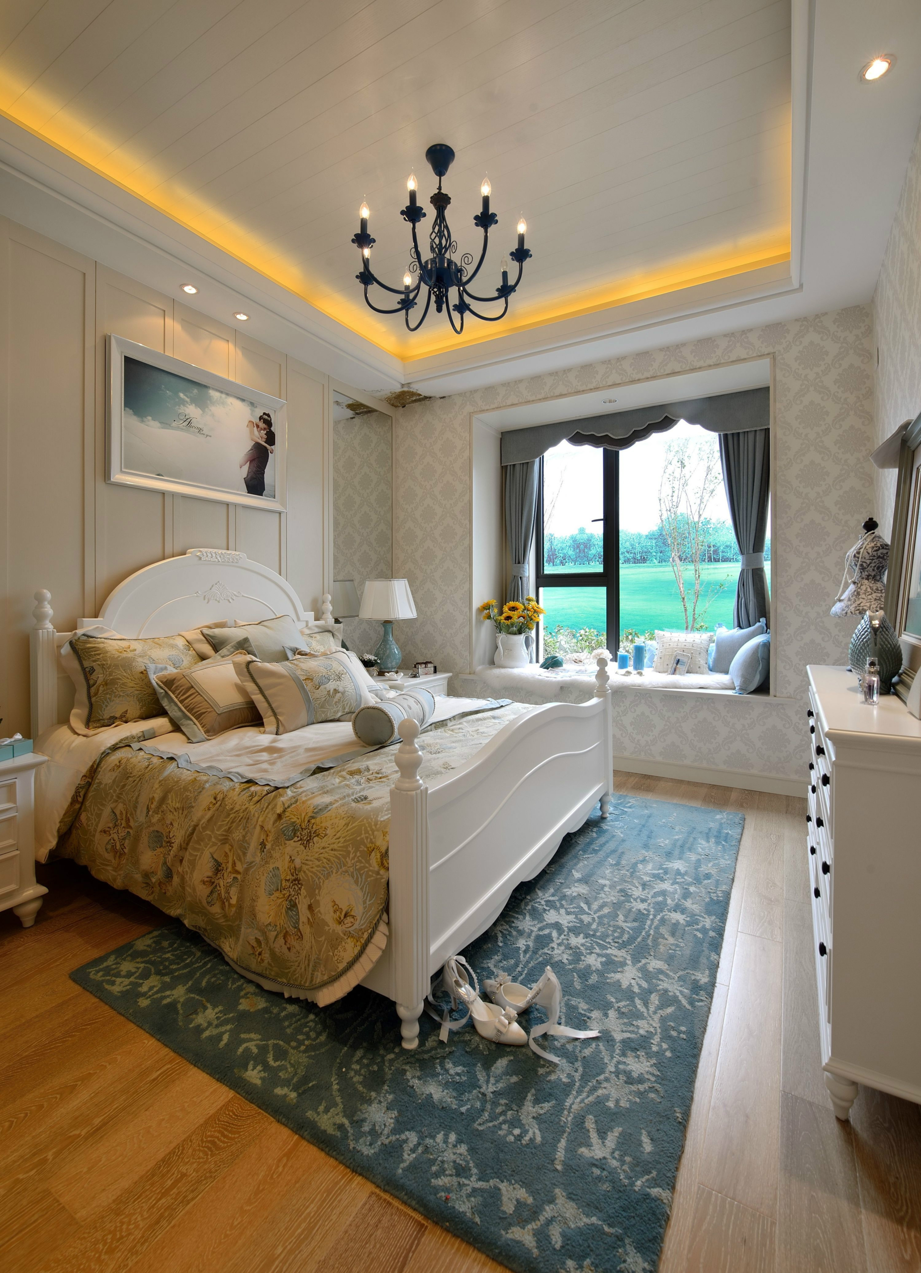 bedroom-with-bed-table-window-with-view-green-field Costs of Adding a Master Suite in the Bay Area